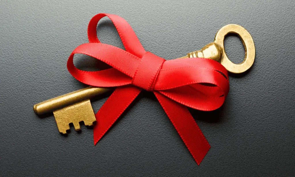 house key with a gift bow